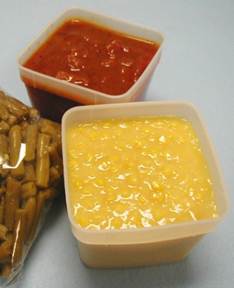 Frozen corn and tomato product