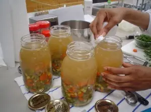 Soup filled jars half and half