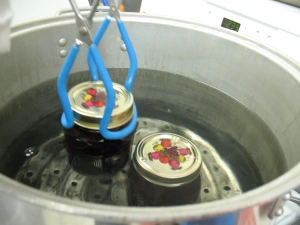 Lowering Jars into Canner