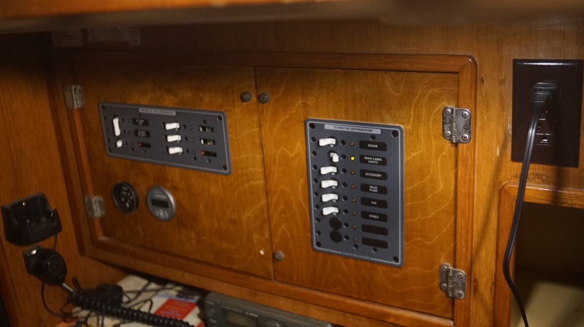 finished breaker panel doors, left side is AC, right is DC