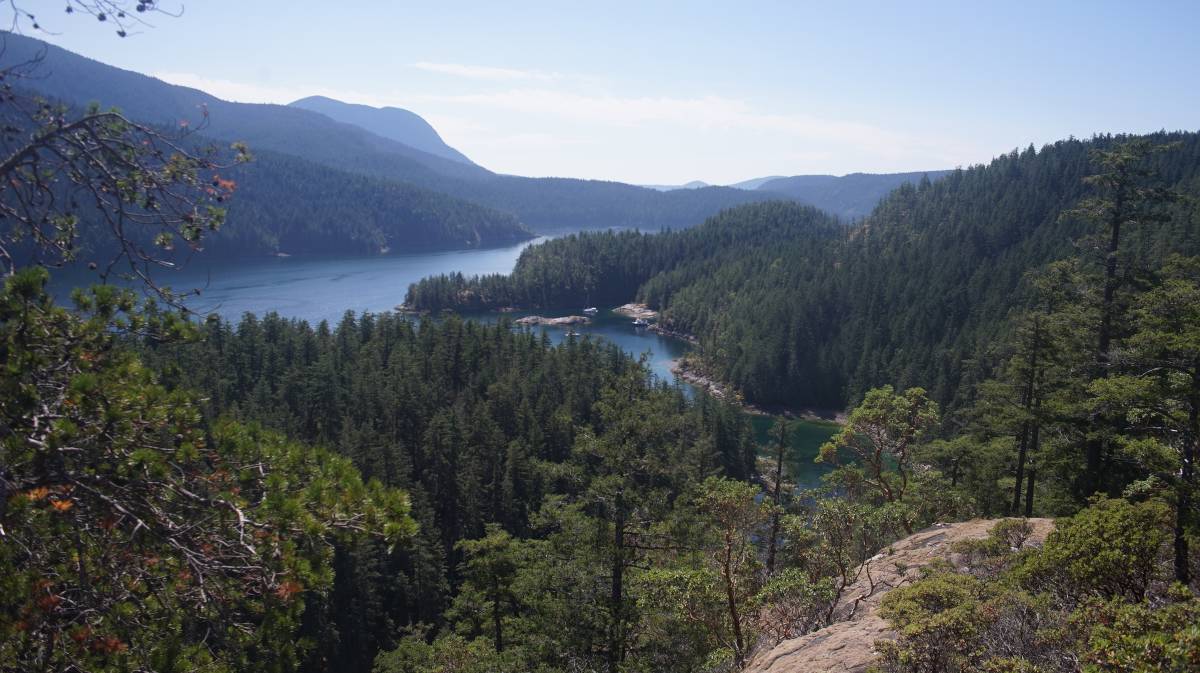 tenedos bay from the cliff lookout, with pino anchored in the bay below