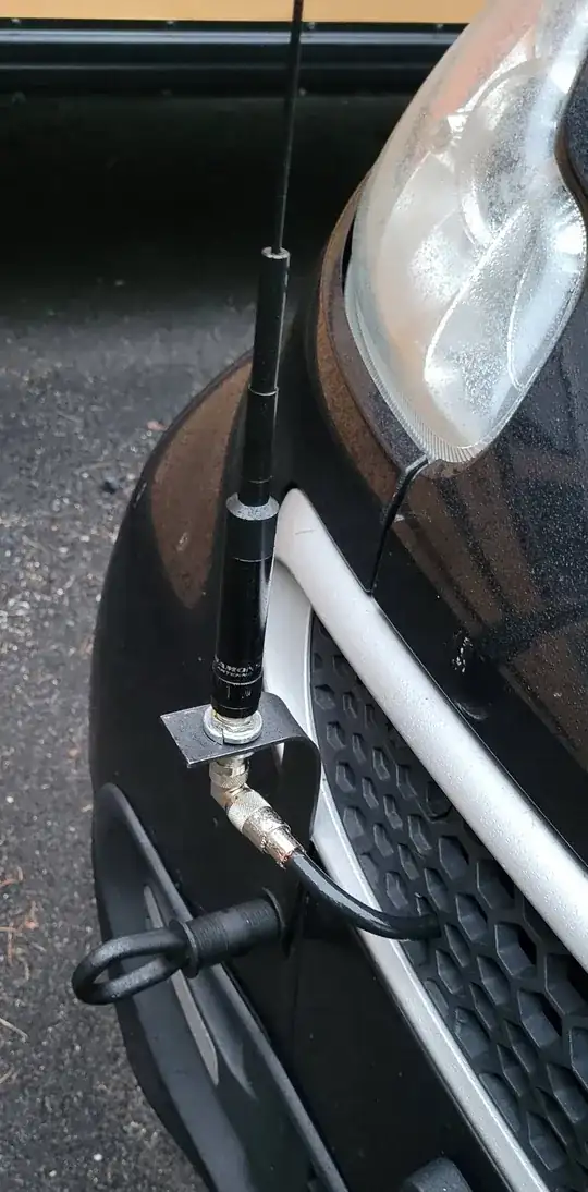 Diamond antenna on piece of steel blowtorched into 90 degree submission