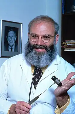 A portrait of Oliver Sacks in his office