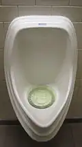 Waterless urinal in California