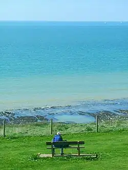 Man sitting alone on a bench