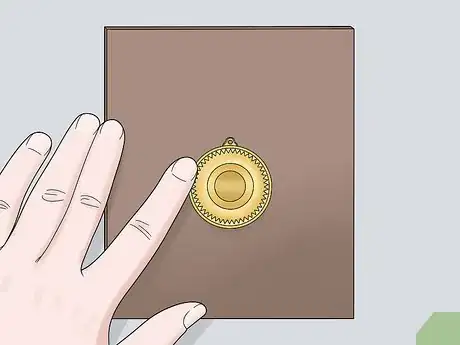 Image titled Hang Your Medals Step 9