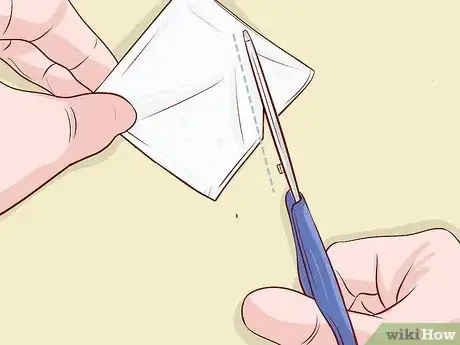 Image titled Hide a Hole in a Shirt Step 7