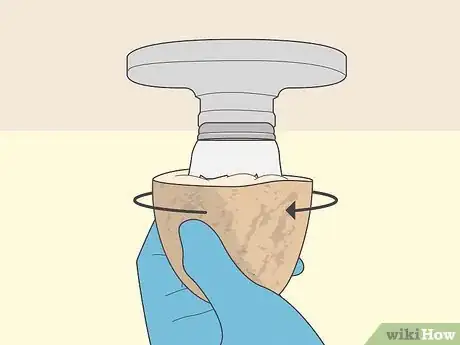 Image titled Remove a Broken Light Bulb with a Potato Step 8