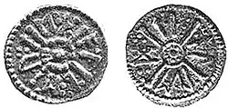 a coin of Alberht I.[25] Both sides of the coin have text in runes laid out between the limbs of a saltire pommée, decorated with pellets. Obverse: eþ æl be rt; reverse: ti æl re d.[26]