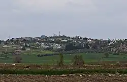 A image showing the village from a distance