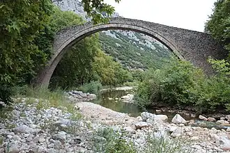 Arch bridge crossing Portaikos river