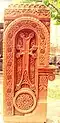 Khachkar «Re» monument at St. Mesrop Mashtots church in Oshakan