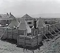 Stockade walls being filled with gravel, Kibbutz Ginosar 1937
