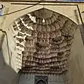 Muqarnas plasterwork visible on the upper part of the entrance