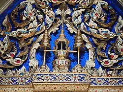 The pediment depicting a royal crown, the symbol of King Mongkut