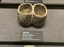 Stone pot with two mouths, 4200–3900 BCE, Chemurcheck cemetery, Altay City.