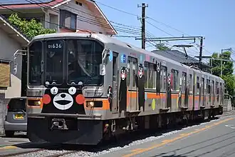 A passenger train between Fujisakigu-mae and Kurokamimachi stations.