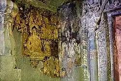 The most intact painting in Cave 6: Buddha seated in dharma-chakra-mudra[148]
