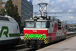 Sr1 3093 in a white-red VR livery with safety tape