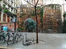 Remains of the Roman wall in Plaça dels Traginers.