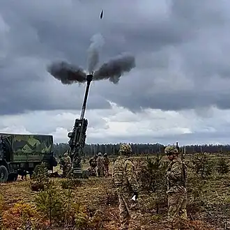 Soldiers of 1-119 FA conduct live-fire training alongside their Latvian counterparts at Adazi Training Center, Latvia, during exercise Summer Shield XIII.