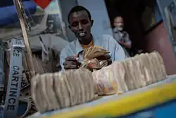 A money exchanger counts Somali shilling notes on the streets of the Somali capital Mogadishu.