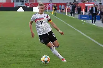Popp during an international friendship match against Chile, 2019