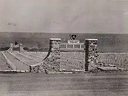 Iwo Jima cemetery entrances built by the 133rd Seabees, with the 3rd Marine Division forward and the 4th Marine Division opposite.