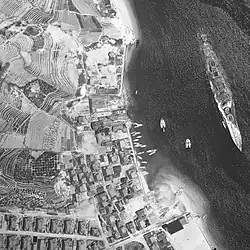 Wreck of Haruna partially scrapped, with her superstructure and guns removed, 19 May 1947