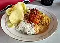 Bihun goreng as add on topping in Betawi nasi uduk in Jakarta