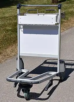 A passenger-operated baggage trolley