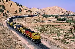 ATSF 9542 in Kodachrome leads other locomotives in the Freightbonnet livery in 1990