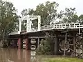 Old North Bourke bridge, in flood, northern side, North Bourke (2021)