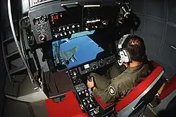 The KC-10's refueling boom operator cockpit is seated rather than prone.