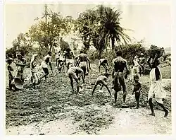 People in Bengal partaking in road making as part of the government's famine relief project.