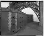 A general view of the northwest wall, in relation to the Fort Point arch of the golden gate bridge.