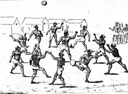 A group of indigenous people playing a ball game in French Guiana