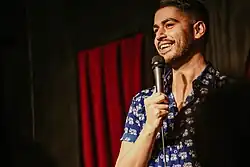 photo of smiling comedian