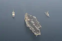 USS Nimitz and the frigates Jean Bart and Auvergne on 19 September 2017.
