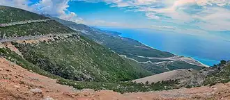 The Llogara Pass divides the Ceraunian Mountains into a western and an eastern range.