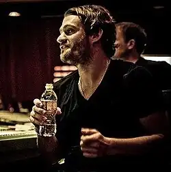 Alex James in a studio