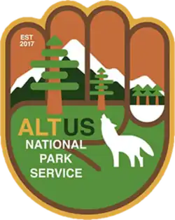 Wilderness images inside a raised fist