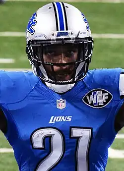 Ameer Abdullah in a Detroit Lions uniform and helmet. Roughly from the stomach up, not showing his arms.