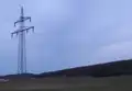 Suspension tower of a 110 kV-line with garland-like communication cable on the ground conductor