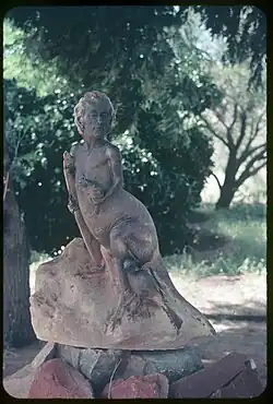 Photograph of a sculpture featuring a self portrait of Rickett's