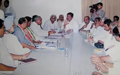 D. Srinivas chairing a meeting of the APCC in Hyderabad. Also seen in the picture is former Prime Minister Dr. Manmohan Singh