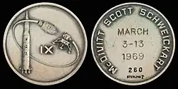 Apollo 9 mission emblem (front). Crew names, flight dates, and serial number 260 (back)