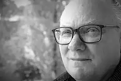 Black and white portrait of a middle aged man