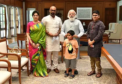 Arvind Dharmapuri with his wife, Priyanka Dharmapuri, and sons, Rudraksh and Samanyu, meeting PM Narendra Modi