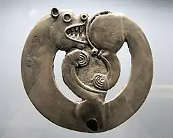 Curled-up feline animal from Arzhan-1, circa 800 BC.[198]
